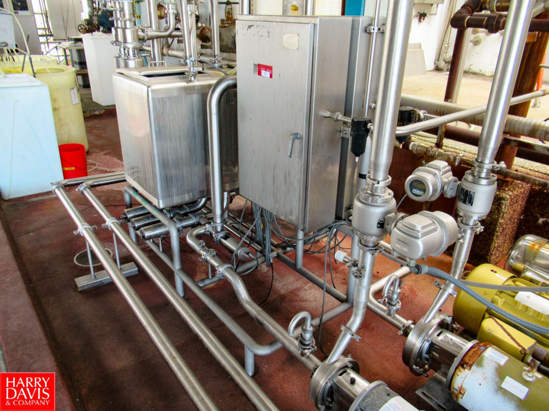2 Tank Skid Mounted CIP System With (2) 24" x 24" x 30" Tanks, with 16" x 16" MH, (2) 15 hp/3500 rpm