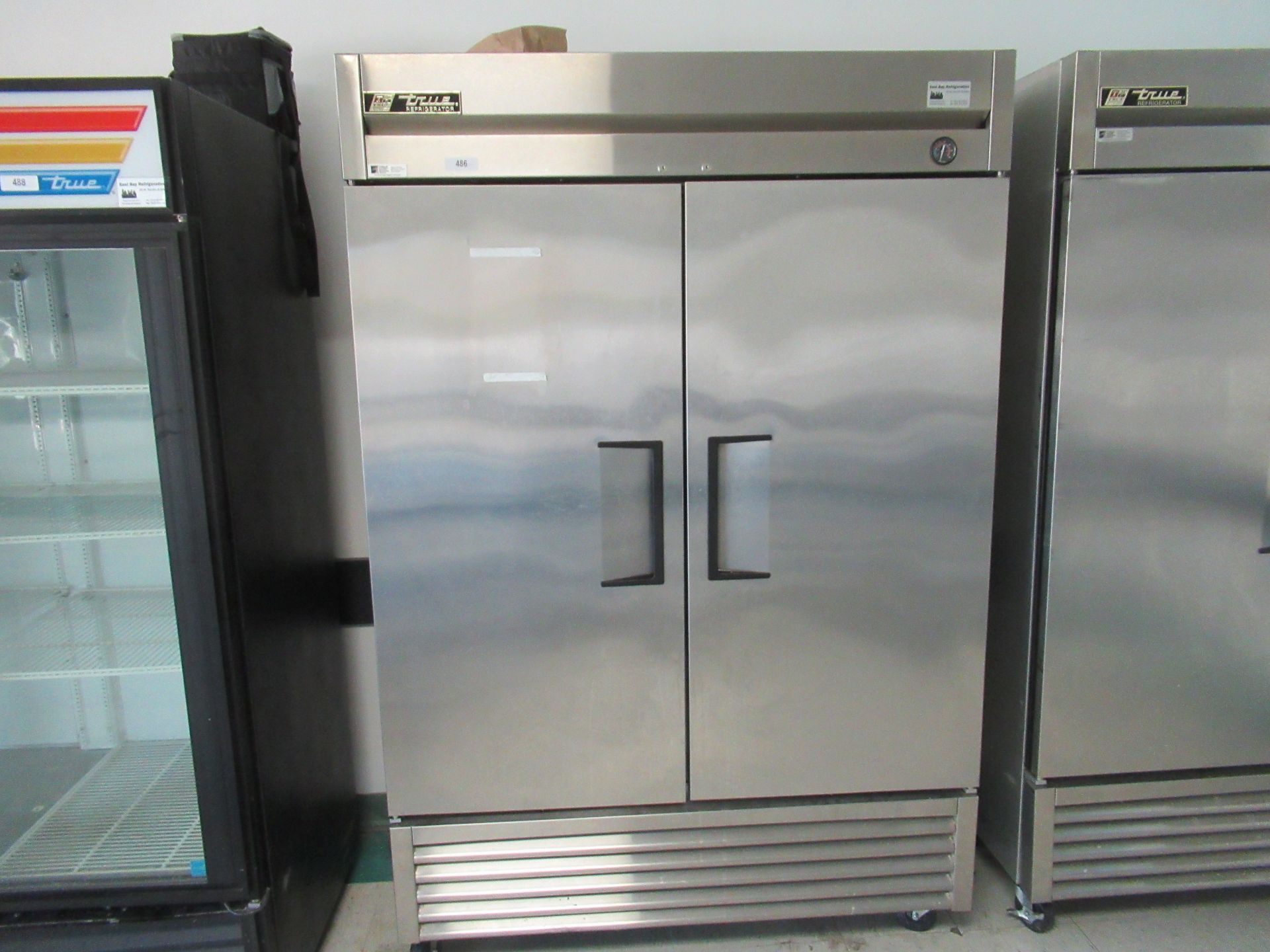 TRUE 2-Door Reach In Refrigerator, Model T-49 Located In: Office Break Room - Rigging Fee: $ 250