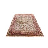 Tabriz rugTabriz rug, beige ground, dense pattern of flowering and leafy stems, red border with