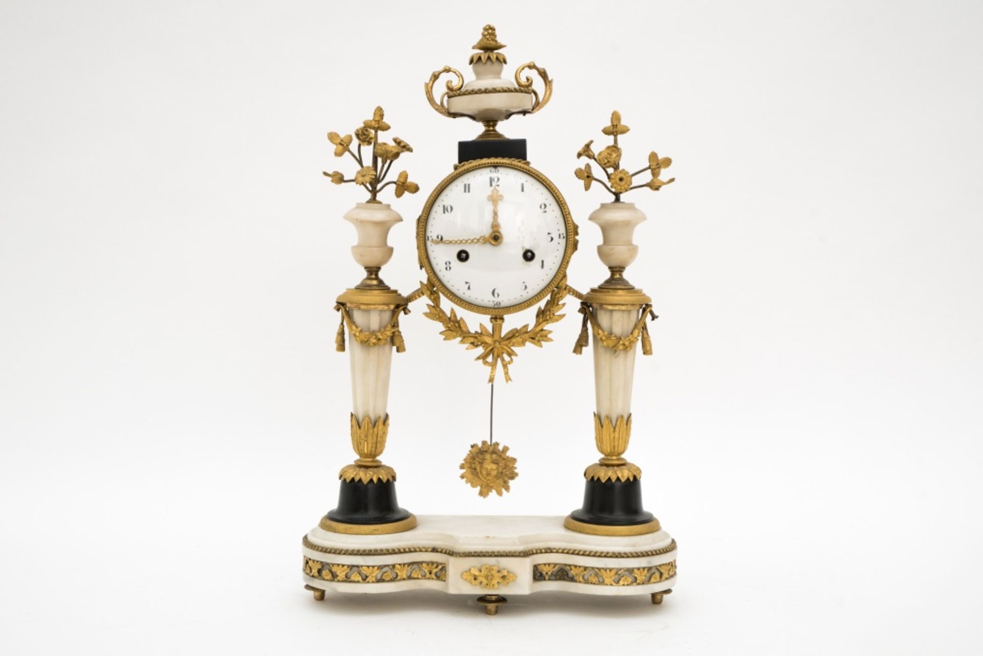 Late 18th century eraLouis XVI portico clockWhite and black marble, decorated with gilt bronze