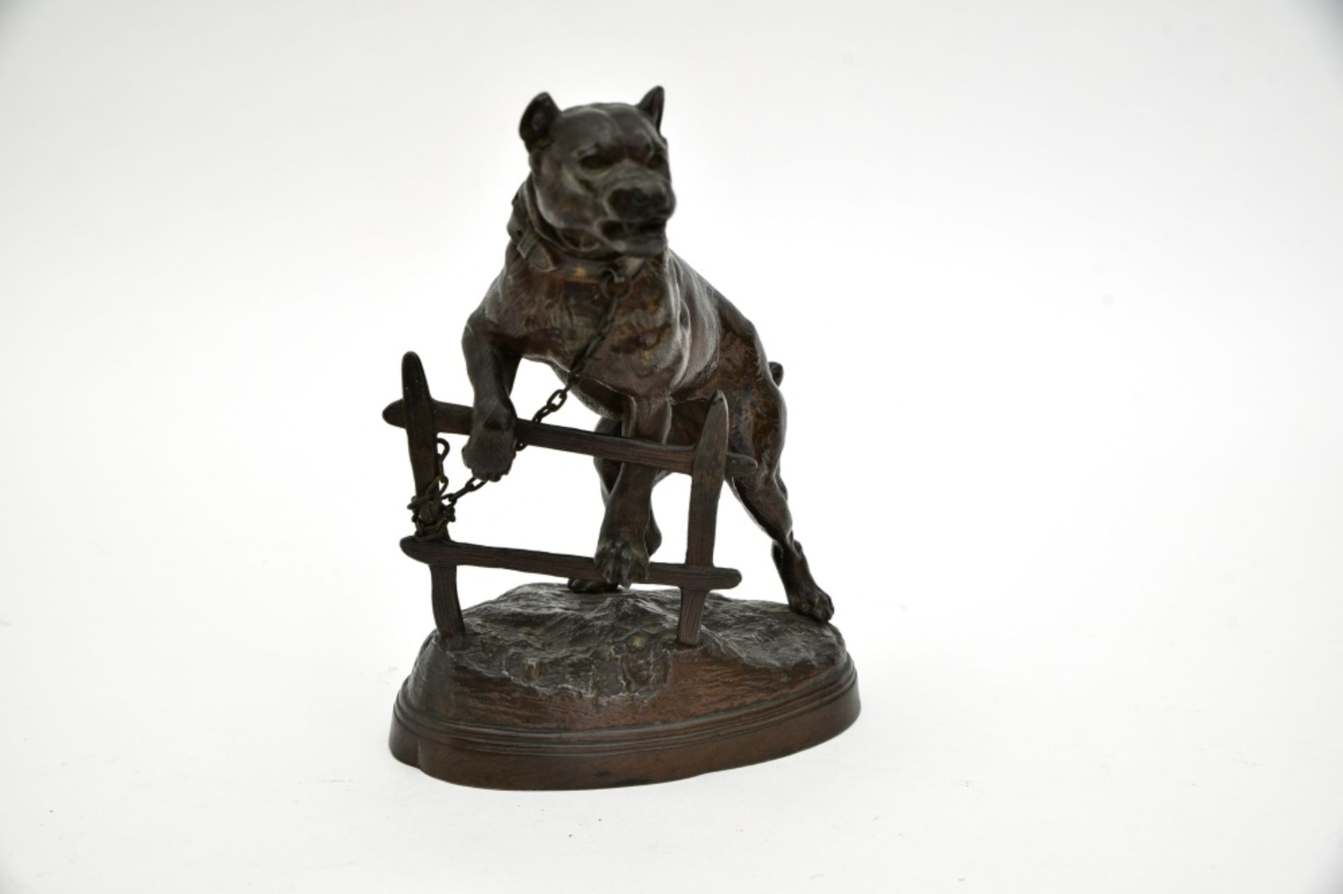 Charles Valton (1851-1918)Dog at the fenceBabbitt metal sculpture with dark brown patina. Signed