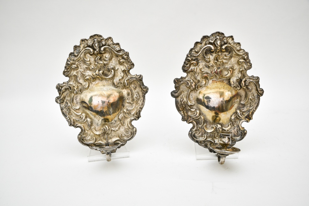 Two reflective sconcesPair of false sconces in silver-coated bronze, one with a drip tray, one
