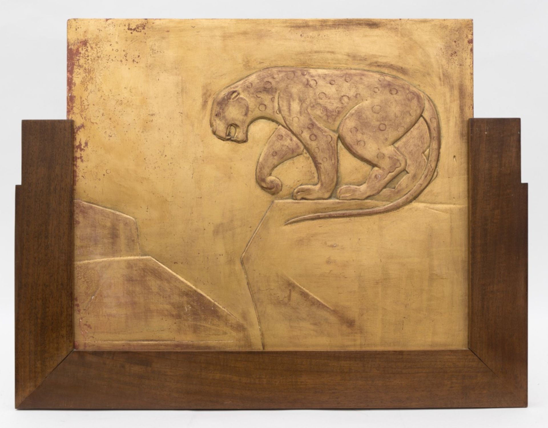 Léon Jallot (1874-1967)JaguarStuccoed and giltwood bas-relief set in a padauk wood half-frame.For