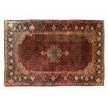 Bijar rugBijar rug, red ground covered in flowering stems, cream-coloured medallion and spandrels,