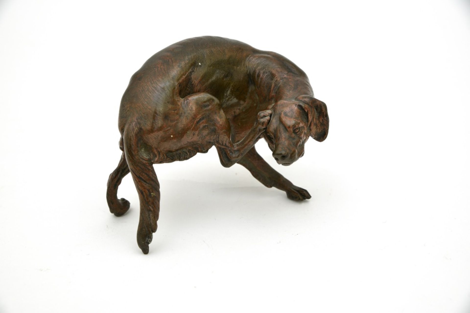 Victor Chemin (1825-1901). After.Spaniel scratching itselfBronze sculpture with brown-shaded patina.