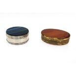 Two pillboxesOne made of amber agate and pomponne brass, the other made of blue agate and silvery
