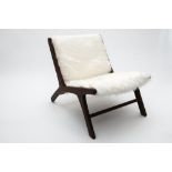 Olivier de Schrijver (Born in 1958)Duchess modelLow armchair made of mahogany and synthetic white