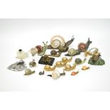 Collection of 23 snailsCeramic, bronze, opalescent glass, resin, pewter, and mother-of-pearl. Some