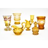 Bohemia, 19th centuryLot of yellow cut crystal with etchingComprises two pitchers, a flask with