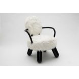 Olivier de Schrijver (Born in 1958)WilliamBlack-stained wooden armchair with white synthetic fur.