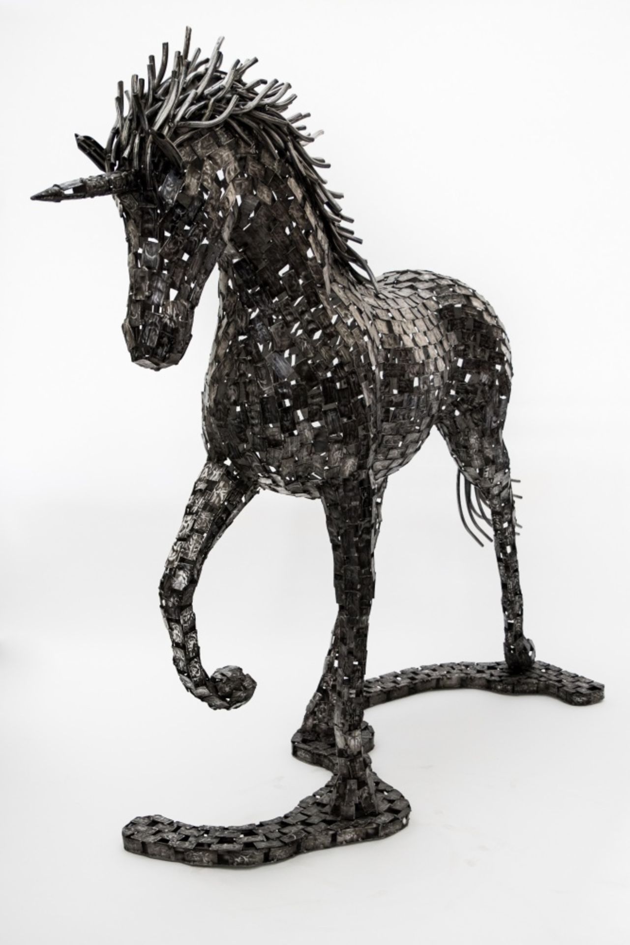 Olivier de Schrijver (Born in 1958)UnicornSculpture made of welded aluminium plaquettes and powder-