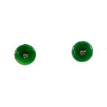 Pair of jade earrings Rhodium-plated silver, each adorned with a jade disk and a small zircon in