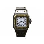 Cartier Lady's square Santos watch Steel and gold. Automatic movement. Yellow gold dial (23 mm),