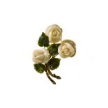 Rose bouquet brooch 14 kt yellow gold depicting a bouquet of 3 roses made of angel skin coral. The