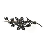 Trembleuse brooch 18 kt yellow gold and silver, depicting a flowering branch set with rose-cut