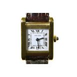 Cartier Tank Lady watch 18 kt yellow gold, rectangular casing (20 mm), white dial, Roman numerals.