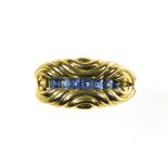 Ring band with secret compartment 18 kt yellow gold with a wavy pattern. The centre opens to reveal