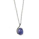 Tanzanite pendant 18 kt white gold, set with a +/- 15.3 x 12 x 8.2 mm tanzanite, embellished with