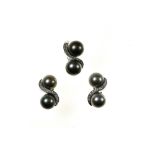Grey Tahitian pearl demi-parure Composed of a pair of clip earrings and an 18 kt white gold ring,