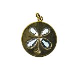 Lucky charm pendant 18 kt yellow gold, round, set with 4 tear-shaped blue sapphires forming a four-