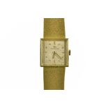 Jaeger Lecoultre Lady's watch 18 kt yellow gold, square dial (22 cm), golden ground, bar index.