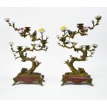 China, 20th century Pair of candelabras featuring birds, Bronze and porcelain. Mark under the base.