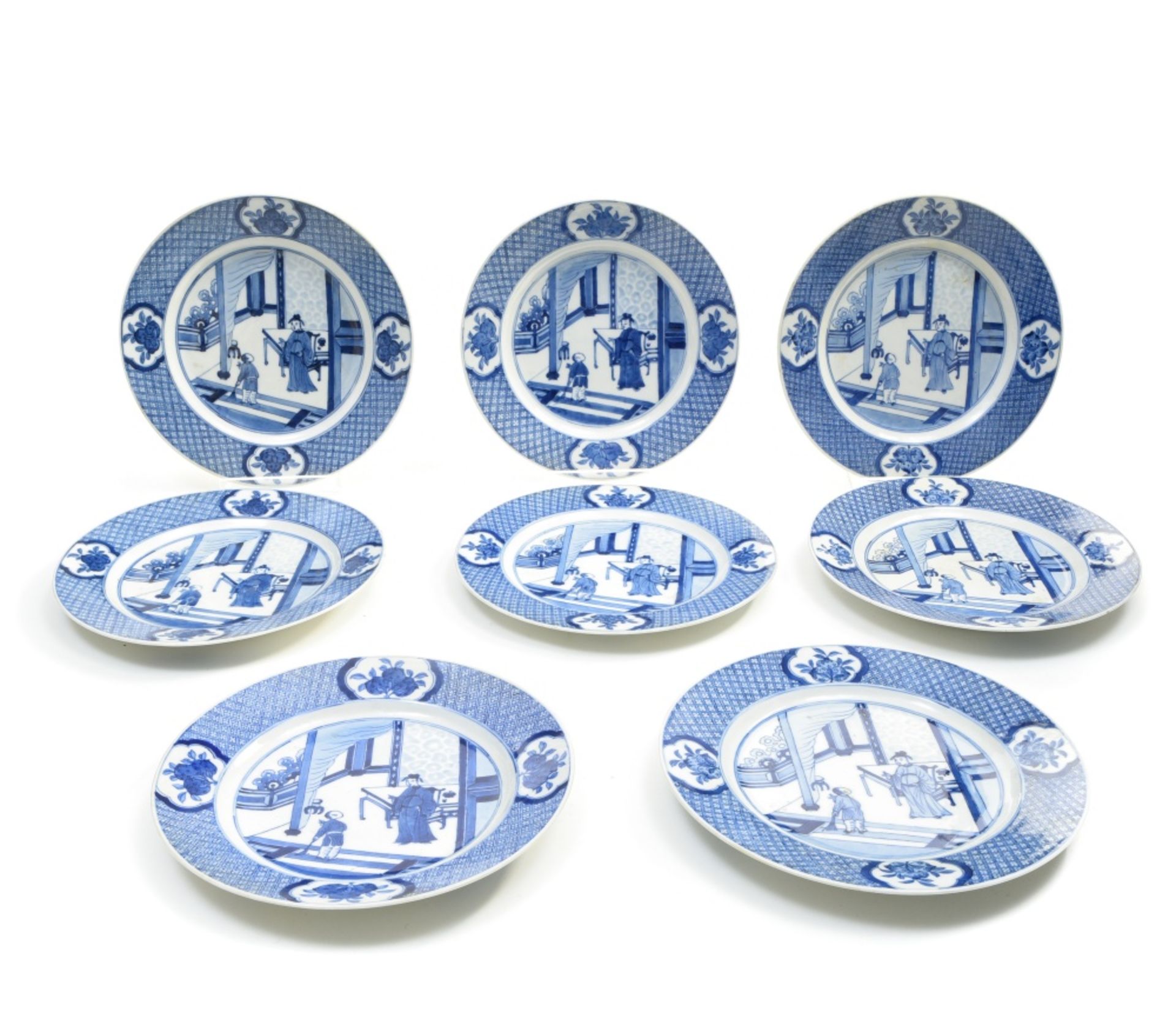 China, 18th-19th century Set of eight plates decorated with a scholar and his apprentice, Blue and