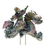 China, 20th century Immortal riding a dragon in the clouds, Polychrome majolica. On a stand. Height