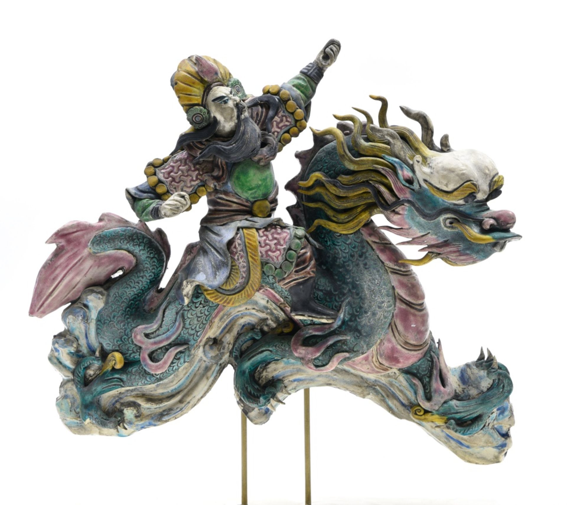 China, 20th century Immortal riding a dragon in the clouds, Polychrome majolica. On a stand. Height