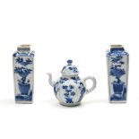 China, 18th century Two small bevelled vases and a teapot, Blue and white porcelain, with Kangxi
