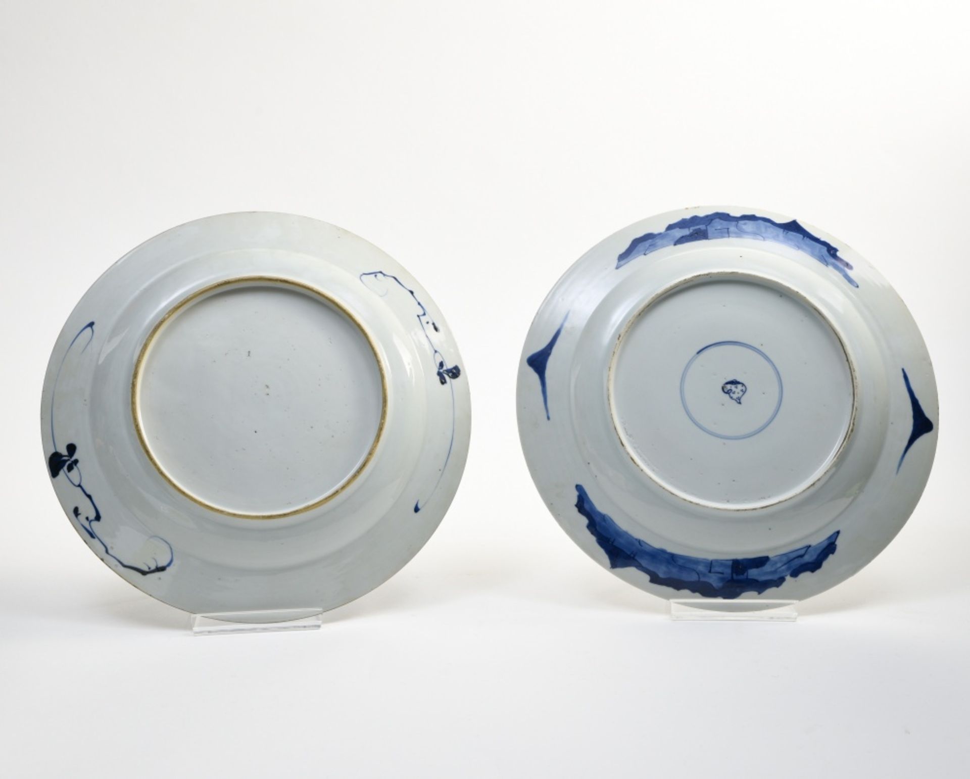 China, 18th-19th century Two soup plates, Blue and white porcelain, one has a conch mark under the - Image 2 of 2