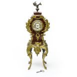 EDWARD & Sons, Paris Rocaille cartel clock, Bronze and tortoiseshell. Enamelled dial with Roman