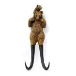 Black Forest work Two hat hangers, Horn and carved wood, one depicting a bear with its cub, the