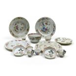China, 18th century Set of Famille Rose porcelain, Composed of three flat plates (approx. 23 cm