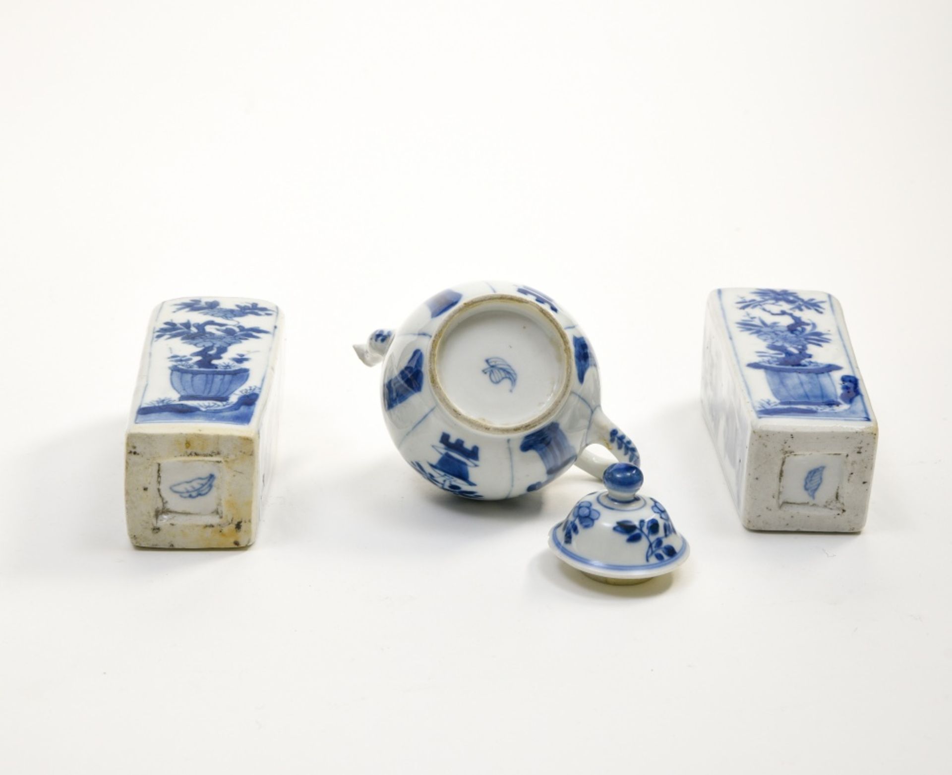 China, 18th century Two small bevelled vases and a teapot, Blue and white porcelain, with Kangxi - Image 2 of 2