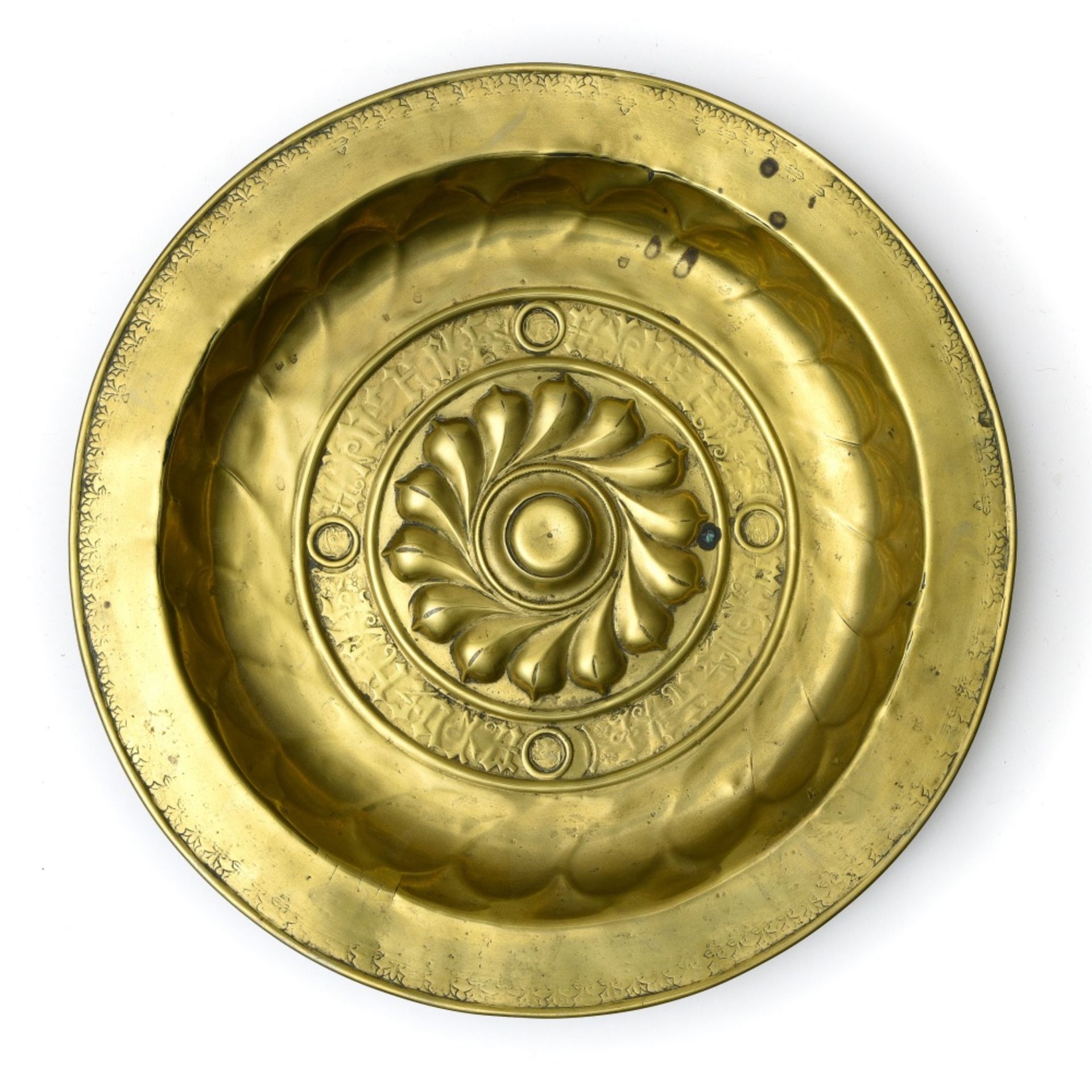 Germany, likely Nuremberg, 17th century Collection plate, Brass embossed with gadroons and a frieze