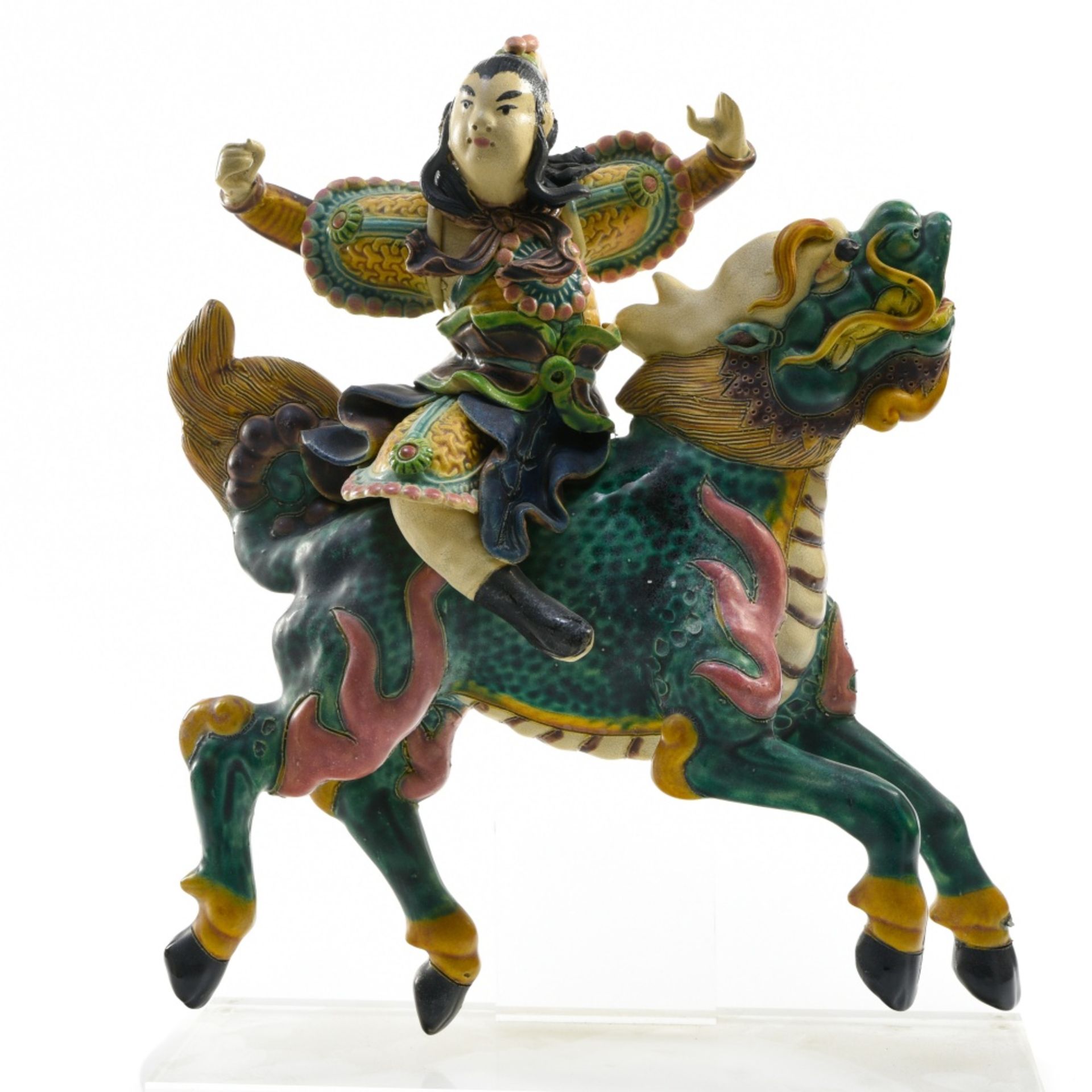 China, 20th century Immortal riding a qilin, Polychrome majolica. On a stand. Height (cm) : 23 -