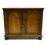 Dutch work Neo-Renaissance style sideboard, Two carved oakwood doors, decorated with stylized