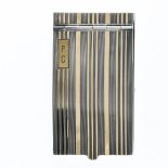 Art Deco dance card Silver and 14 kt yellow gold. The casing is striped with smooth gold lines.