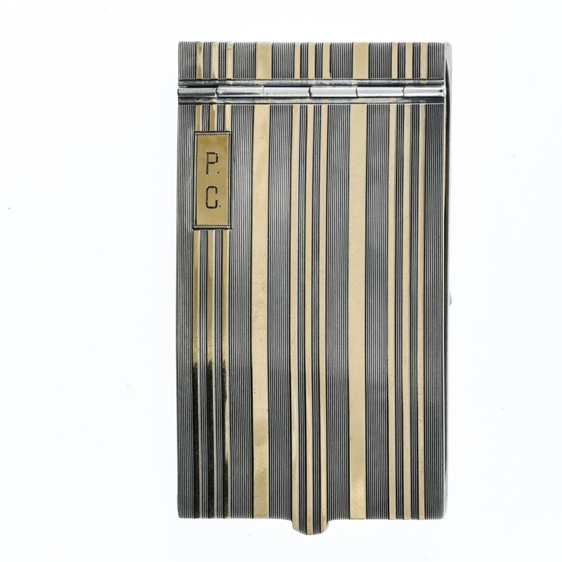 Art Deco dance card Silver and 14 kt yellow gold. The casing is striped with smooth gold lines.