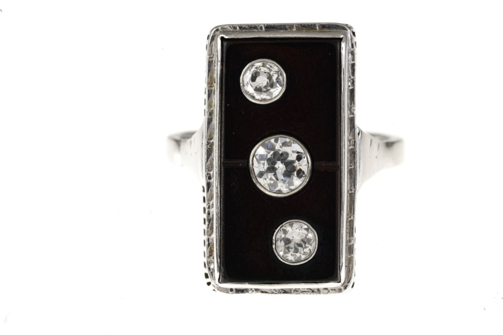 "Domino" ring 14 kt white gold, the rectangular plaque is made of onyx, depicting a domino set with