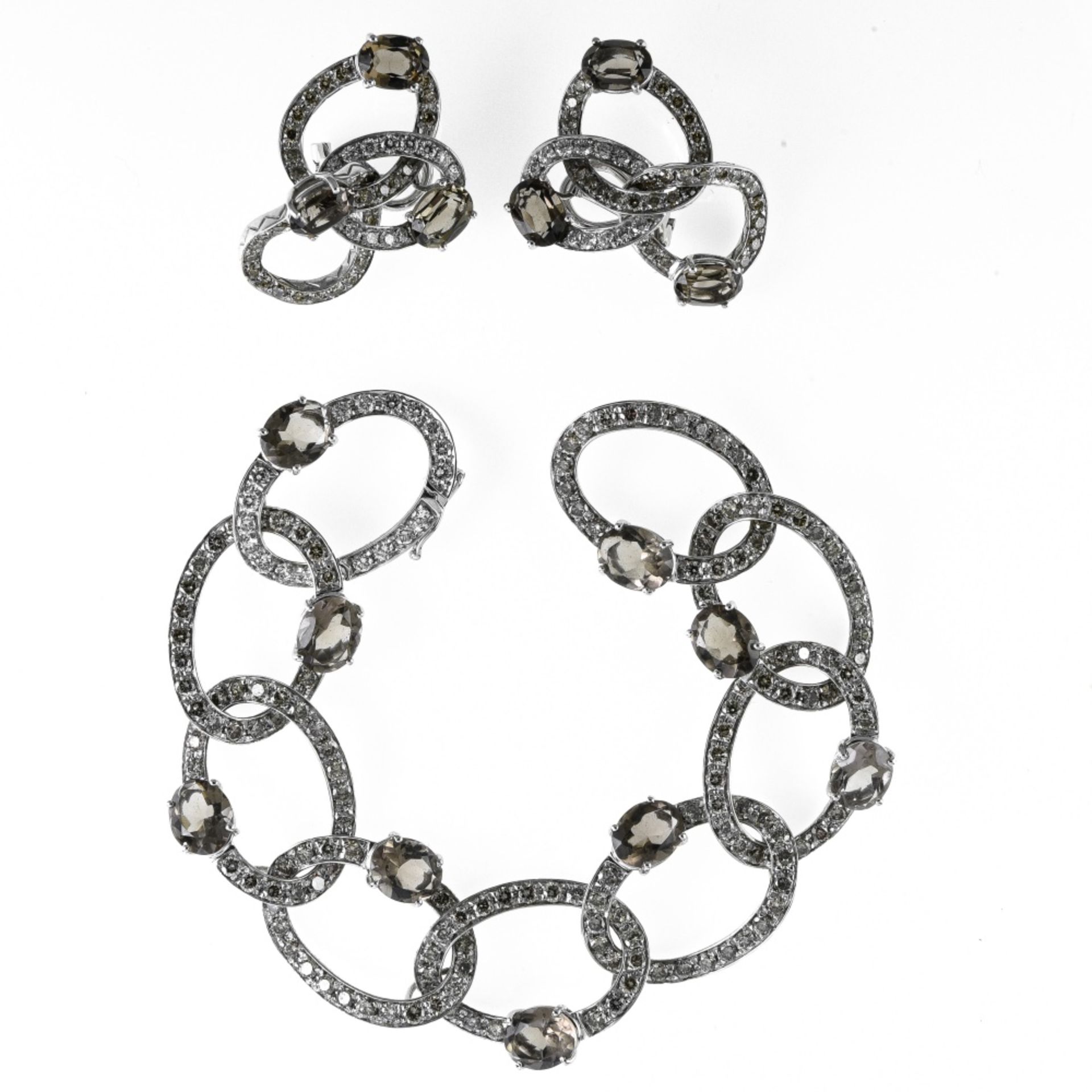 Robotti Demi-parure 18 kt white gold, composed of a bracelet and a pair of drop earrings set with