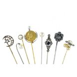 Set of eight tie pins Yellow gold and silver, rose-cut diamonds, pearls, and a "springtime"