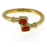 Biko Coral bangle 18 kt yellow gold, set with a coral cabochon on either end. Hinged. Italian