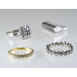 Set of four rings 18 kt yellow and white gold, brilliants Poids (gr) : 24,2
