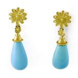 Pair of turquoise drop earrings 18 kt yellow gold, composed of a turquoise drop topped by a gold