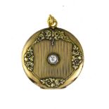 Art Deco photo locket Vermeil and 18 kt yellow gold, round, set with a small old-cut diamond in the