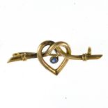 Victorian "heart" brooch 9 kt yellow gold, depicting a heart set with a small sapphire. Late 19th