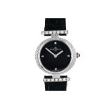 Baume & Mercier lady's watch 18 kt white gold, round dial, black ground, flanked by 2 barrettes set