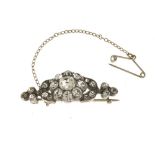 Rhinestone brooch-barrette Silver, adorned with a floral pattern set with rhinestones. Safety